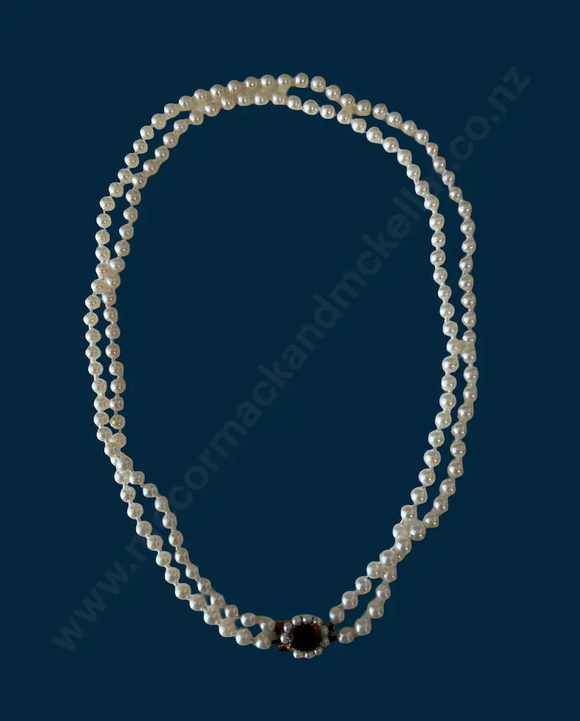 Double Strand Seawater Cultured Pearl Necklace with 9ct Gold & Garnet Clasp L47cm, TW36.13gms, Valuation $1100.00 Image 1++