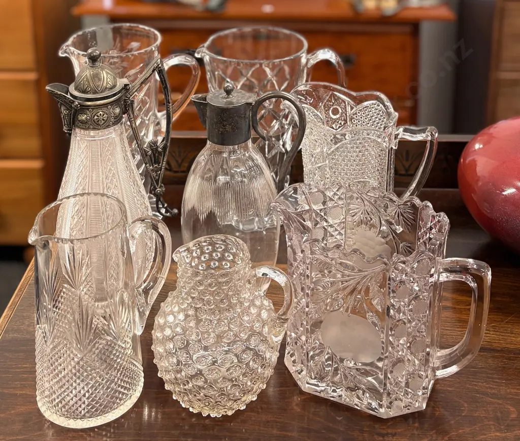 Six Cut Glass Water Jugs and Two Claret Jugs Image 1++