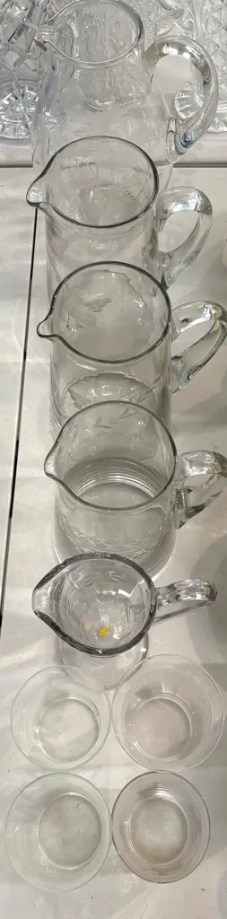 Five Etched Glass Water Jugs and Four Glasses Image 1++