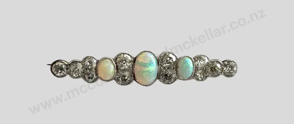 18ct White Gold and Platinum Twelve Diamond Three Opal Bar Brooch, Please see attached Purchase Invoice Image 1++