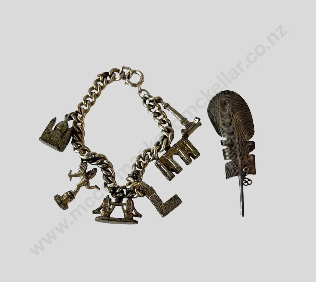 Sterling Silver Feather Brooch and Sterling Silver Curb Link Bracelet with Silver Charms Image 1++