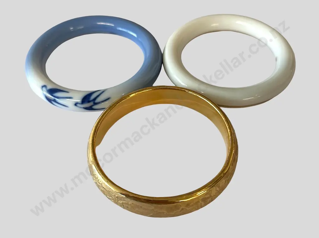 Two Georg Jensen Porcelain Bangles and a Gilt Bangle Image 1++