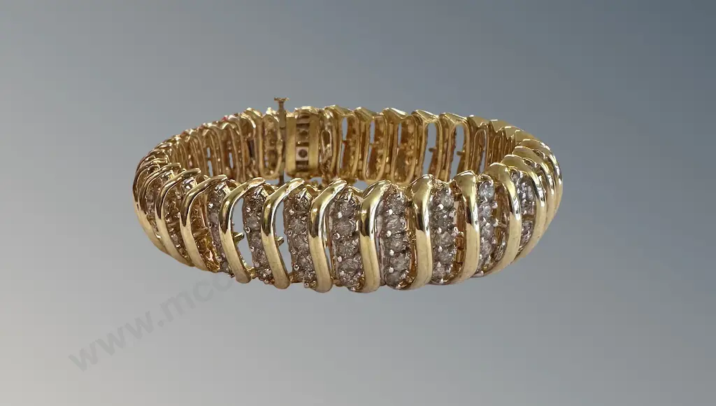 10ct Gold Diamond Bracelet with articulated links, TDW9.6ct, TW40.7gms, Valuation $18000 Image 1++