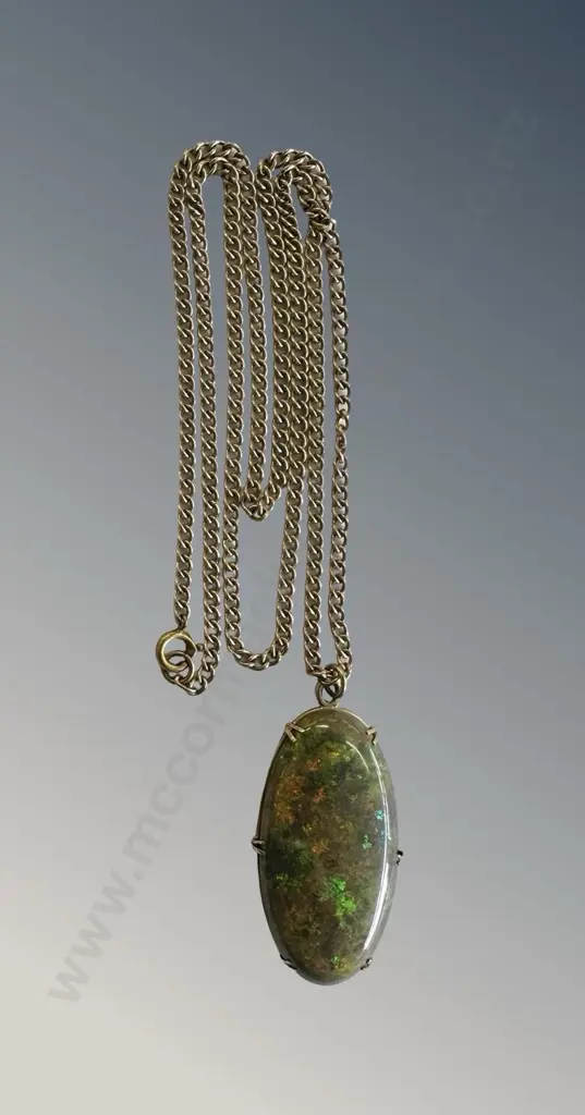 9ct Gold Mounted Opal Pendant 4.3cm, with plated curb link chain, pendant weight 7.4gms Image 1++