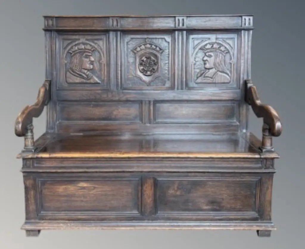 Oak Bench Seat with Carved Figural Panels and Internal Storage H104xL114xD45cm Image 1++