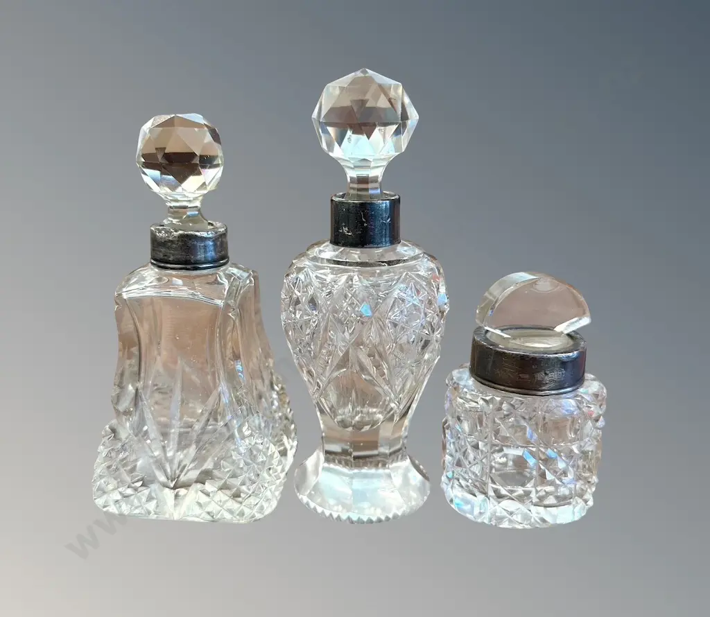 Three Sterling Silver Mounted Scent Bottles Image 1++