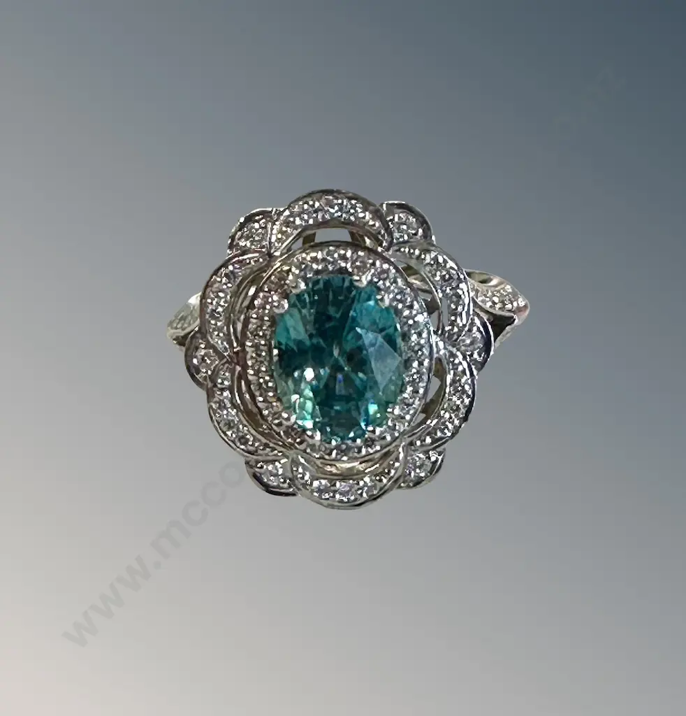 18ct Yellow and White Gold Blue Zircon and Diamond Cluster Ring, Size O, Valuation $11290 Image 1++